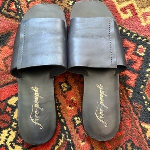 Free People Black Leather Slide Sandals with Gold Logo